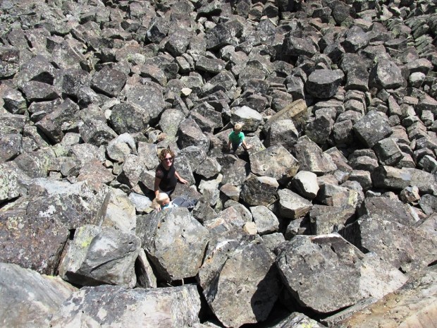 Joe climbed all the way to the top of the cliff.